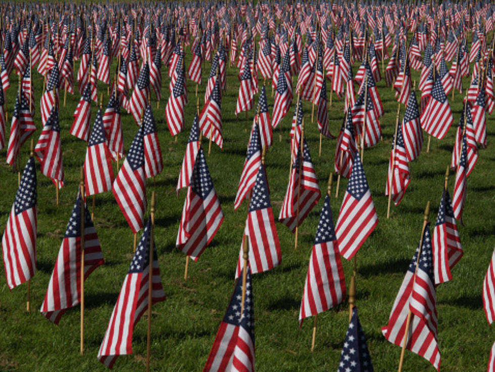 Volunteers Needed to Set Flags at Woodlawn Cemetery